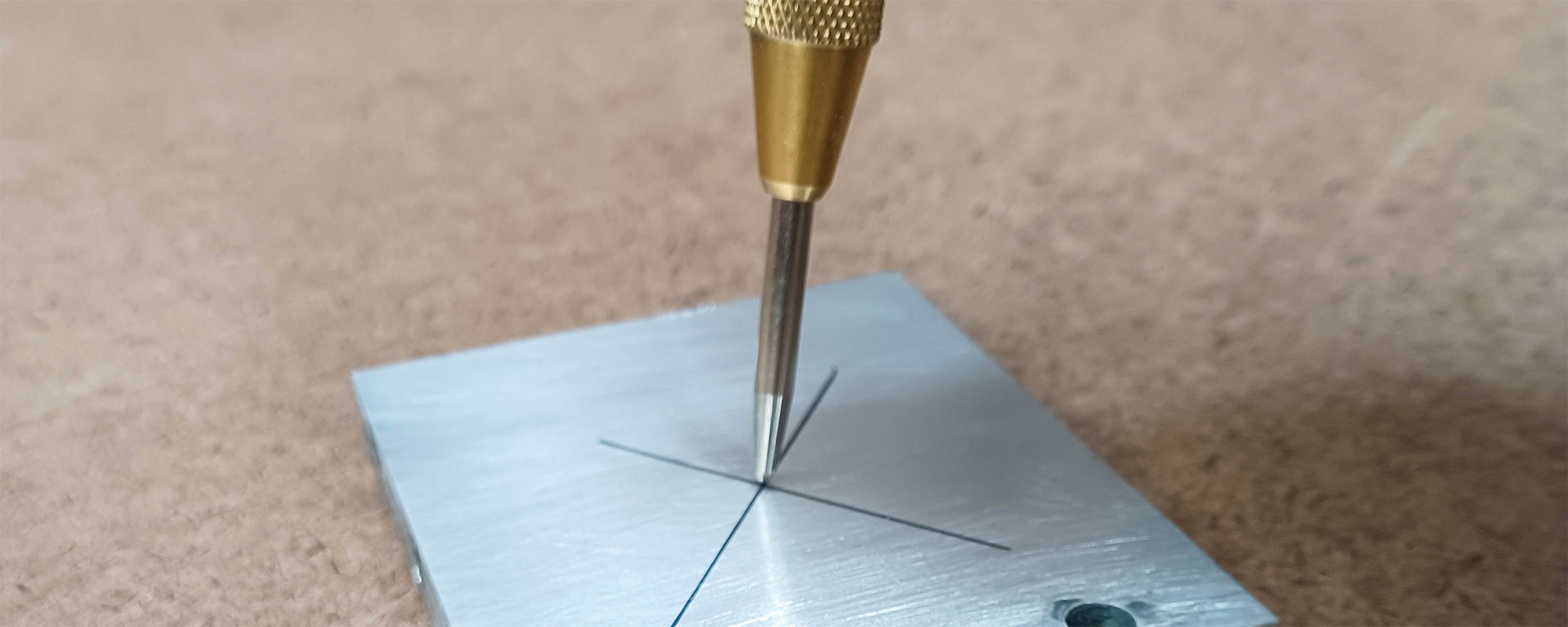 A center punch is perfect for marking metal